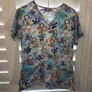 - Garfield and Odie scrub top small floral lilac blue white.